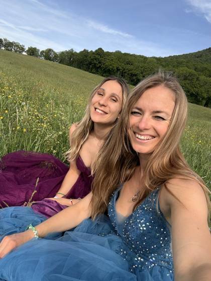 Selfie in gowns in a summer meadow